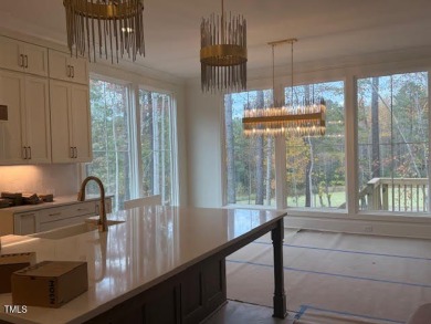 This  beautiful custom home built by gold winning Triple A Homes on Chapel Ridge Golf Club in North Carolina - for sale on GolfHomes.com, golf home, golf lot