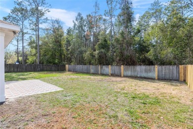 Step inside this beautifully updated 4-bedroom, 2.5-bathroom on Haile Plantation Golf and Country Club in Florida - for sale on GolfHomes.com, golf home, golf lot