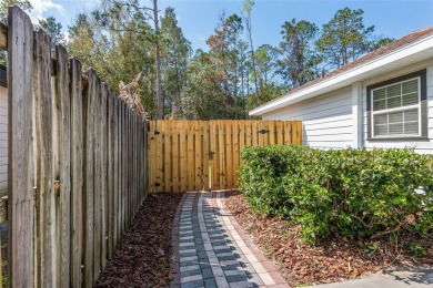 Step inside this beautifully updated 4-bedroom, 2.5-bathroom on Haile Plantation Golf and Country Club in Florida - for sale on GolfHomes.com, golf home, golf lot