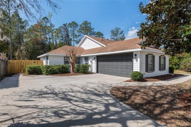 Step inside this beautifully updated 4-bedroom, 2.5-bathroom on Haile Plantation Golf and Country Club in Florida - for sale on GolfHomes.com, golf home, golf lot