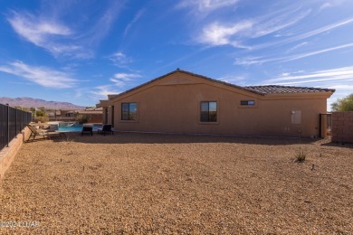 Discover this stunning, custom-built 4-bedroom home with an RV on The Refuge Golf and Country Club in Arizona - for sale on GolfHomes.com, golf home, golf lot