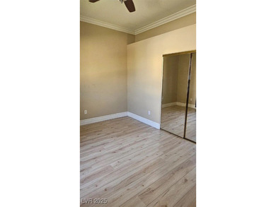 Experience resort-style living in this beautiful single-story on Rhodes Ranch Golf Club in Nevada - for sale on GolfHomes.com, golf home, golf lot