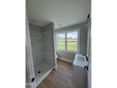 *NEWLY ADDED THIRD BEDROOM AND BATHROOM UPSTAIRS (PERMITTED)!* on  in North Carolina - for sale on GolfHomes.com, golf home, golf lot