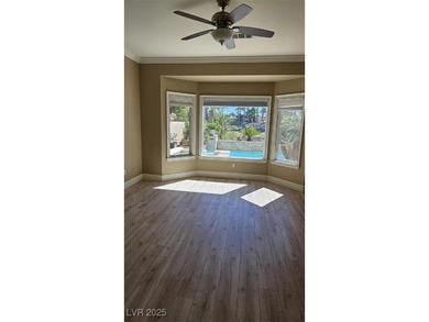 Experience resort-style living in this beautiful single-story on Rhodes Ranch Golf Club in Nevada - for sale on GolfHomes.com, golf home, golf lot