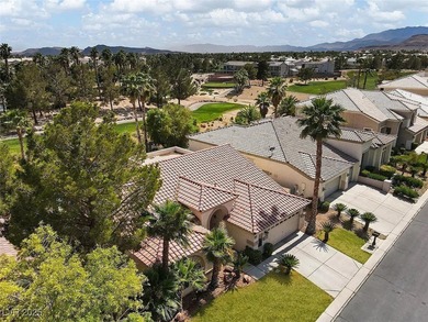 Experience resort-style living in this beautiful single-story on Rhodes Ranch Golf Club in Nevada - for sale on GolfHomes.com, golf home, golf lot