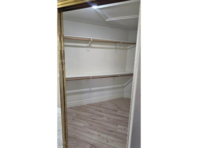 Experience resort-style living in this beautiful single-story on Rhodes Ranch Golf Club in Nevada - for sale on GolfHomes.com, golf home, golf lot