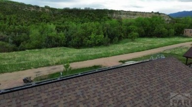 Fantastic location for an incredible newer 1 level ranch home on Hollydot Golf Course in Colorado - for sale on GolfHomes.com, golf home, golf lot