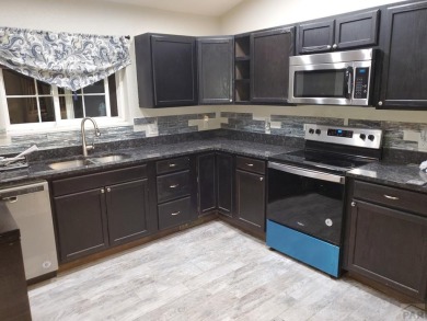 Fantastic location for an incredible newer 1 level ranch home on Hollydot Golf Course in Colorado - for sale on GolfHomes.com, golf home, golf lot