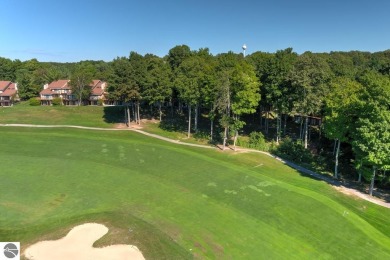 Surrounded by the lush green 3rd fairway of The Legend Golf on Shanty Creek Golf Course in Michigan - for sale on GolfHomes.com, golf home, golf lot