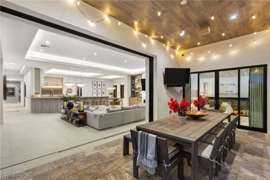 Situated in the prestigious guard-gated community of Southern on Southern Highlands Golf Club in Nevada - for sale on GolfHomes.com, golf home, golf lot