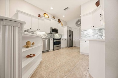 Enjoy peaceful lakefront living in this Turnkey Furnished on Bobcat Trail Golf Club in Florida - for sale on GolfHomes.com, golf home, golf lot