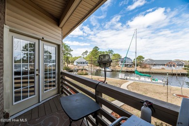 Experience resort-style living in this stunning waterfront home on Harbour Point Golf Club in North Carolina - for sale on GolfHomes.com, golf home, golf lot