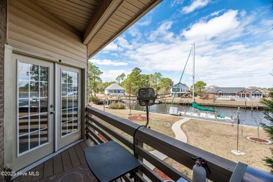 Experience resort-style living in this stunning waterfront home on Harbour Point Golf Club in North Carolina - for sale on GolfHomes.com, golf home, golf lot