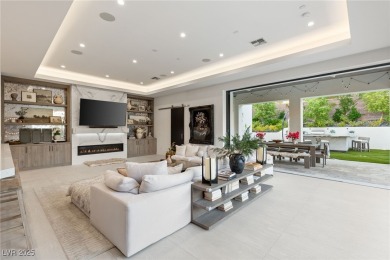 Situated in the prestigious guard-gated community of Southern on Southern Highlands Golf Club in Nevada - for sale on GolfHomes.com, golf home, golf lot