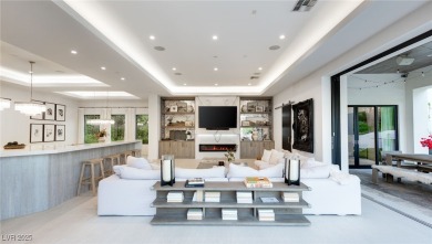 Situated in the prestigious guard-gated community of Southern on Southern Highlands Golf Club in Nevada - for sale on GolfHomes.com, golf home, golf lot