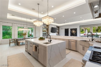 Situated in the prestigious guard-gated community of Southern on Southern Highlands Golf Club in Nevada - for sale on GolfHomes.com, golf home, golf lot