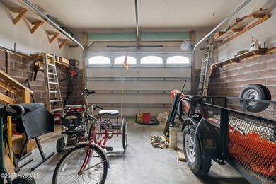 Experience resort-style living in this stunning waterfront home on Harbour Point Golf Club in North Carolina - for sale on GolfHomes.com, golf home, golf lot