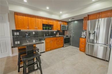 2 BEDS 2 BATHS TOTALLY RENOVATED AND FURNISHED HURRICANE IMPACT on The Diplomat Golf Resort and Spa in Florida - for sale on GolfHomes.com, golf home, golf lot
