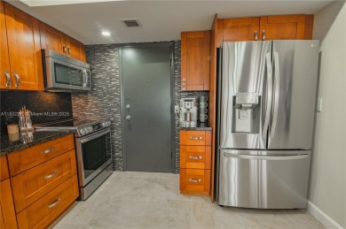 2 BEDS 2 BATHS TOTALLY RENOVATED AND FURNISHED HURRICANE IMPACT on The Diplomat Golf Resort and Spa in Florida - for sale on GolfHomes.com, golf home, golf lot