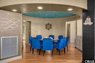 Bold in design and unmistakable in presence, this custom-built on The Currituck Golf Club in North Carolina - for sale on GolfHomes.com, golf home, golf lot