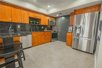 2 BEDS 2 BATHS TOTALLY RENOVATED AND FURNISHED HURRICANE IMPACT on The Diplomat Golf Resort and Spa in Florida - for sale on GolfHomes.com, golf home, golf lot
