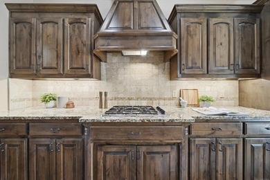 Stunning home backing to a private wooded preserve with on White Hawk Golf Club in Oklahoma - for sale on GolfHomes.com, golf home, golf lot