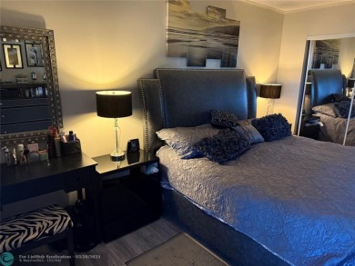 FANTASTIC REMODELED 2 BEDROOMS GROUND FLOOR, Stainless steel on Hillsboro Pines Golf in Florida - for sale on GolfHomes.com, golf home, golf lot