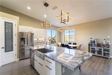 Discover this stunning, custom-built 4-bedroom home with an RV on The Refuge Golf and Country Club in Arizona - for sale on GolfHomes.com, golf home, golf lot