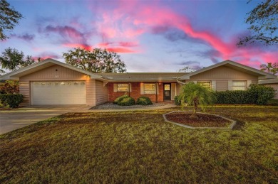 See this stately 4-bedroom, 3-bath home in the highly on The Dunedin Country Club in Florida - for sale on GolfHomes.com, golf home, golf lot