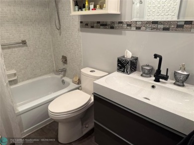 FANTASTIC REMODELED 2 BEDROOMS GROUND FLOOR, Stainless steel on Hillsboro Pines Golf in Florida - for sale on GolfHomes.com, golf home, golf lot