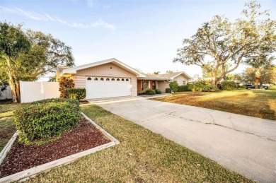 See this stately 4-bedroom, 3-bath home in the highly on The Dunedin Country Club in Florida - for sale on GolfHomes.com, golf home, golf lot