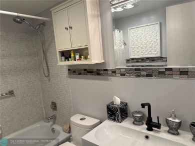 FANTASTIC REMODELED 2 BEDROOMS GROUND FLOOR, Stainless steel on Hillsboro Pines Golf in Florida - for sale on GolfHomes.com, golf home, golf lot