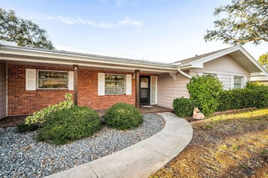 See this stately 4-bedroom, 3-bath home in the highly on The Dunedin Country Club in Florida - for sale on GolfHomes.com, golf home, golf lot