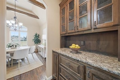 Stunning home backing to a private wooded preserve with on White Hawk Golf Club in Oklahoma - for sale on GolfHomes.com, golf home, golf lot