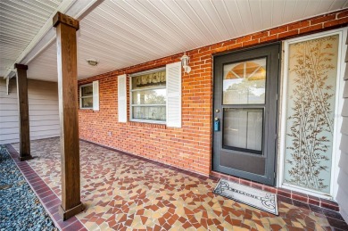 See this stately 4-bedroom, 3-bath home in the highly on The Dunedin Country Club in Florida - for sale on GolfHomes.com, golf home, golf lot