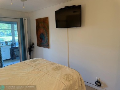 FANTASTIC REMODELED 2 BEDROOMS GROUND FLOOR, Stainless steel on Hillsboro Pines Golf in Florida - for sale on GolfHomes.com, golf home, golf lot