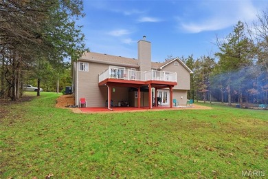 Wake up each morning to the peaceful sounds of hummingbirds and on Raintree Country Club in Missouri - for sale on GolfHomes.com, golf home, golf lot