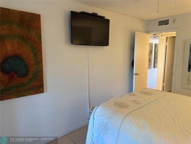 FANTASTIC REMODELED 2 BEDROOMS GROUND FLOOR, Stainless steel on Hillsboro Pines Golf in Florida - for sale on GolfHomes.com, golf home, golf lot