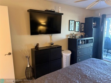 FANTASTIC REMODELED 2 BEDROOMS GROUND FLOOR, Stainless steel on Hillsboro Pines Golf in Florida - for sale on GolfHomes.com, golf home, golf lot