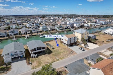 Package sale -- 51 Wilmington St. (single-family) with adjoining on Sea Trail Golf Resort in North Carolina - for sale on GolfHomes.com, golf home, golf lot