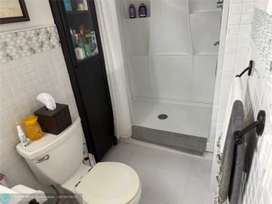 FANTASTIC REMODELED 2 BEDROOMS GROUND FLOOR, Stainless steel on Hillsboro Pines Golf in Florida - for sale on GolfHomes.com, golf home, golf lot