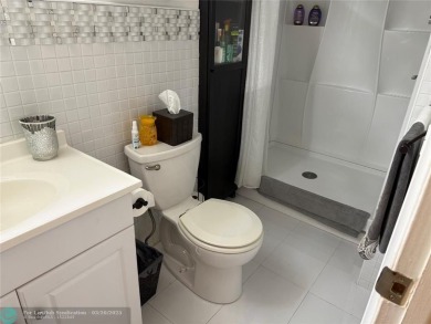 FANTASTIC REMODELED 2 BEDROOMS GROUND FLOOR, Stainless steel on Hillsboro Pines Golf in Florida - for sale on GolfHomes.com, golf home, golf lot