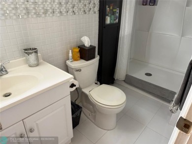 FANTASTIC REMODELED 2 BEDROOMS GROUND FLOOR, Stainless steel on Hillsboro Pines Golf in Florida - for sale on GolfHomes.com, golf home, golf lot