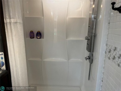FANTASTIC REMODELED 2 BEDROOMS GROUND FLOOR, Stainless steel on Hillsboro Pines Golf in Florida - for sale on GolfHomes.com, golf home, golf lot