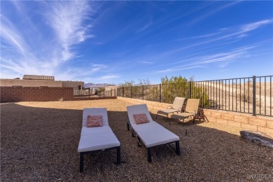 Discover this stunning, custom-built 4-bedroom home with an RV on The Refuge Golf and Country Club in Arizona - for sale on GolfHomes.com, golf home, golf lot