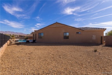 Discover this stunning, custom-built 4-bedroom home with an RV on The Refuge Golf and Country Club in Arizona - for sale on GolfHomes.com, golf home, golf lot