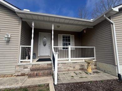 Welcome to this spacious 1500+ sq ft one owner home in Lake on Lake Tansi Village Country Club in Tennessee - for sale on GolfHomes.com, golf home, golf lot