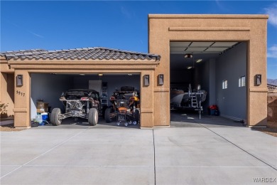 Discover this stunning, custom-built 4-bedroom home with an RV on The Refuge Golf and Country Club in Arizona - for sale on GolfHomes.com, golf home, golf lot