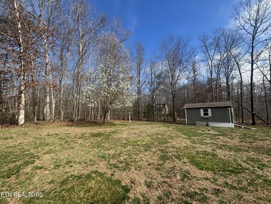 Welcome to this spacious 1500+ sq ft one owner home in Lake on Lake Tansi Village Country Club in Tennessee - for sale on GolfHomes.com, golf home, golf lot