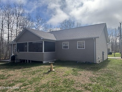 Welcome to this spacious 1500+ sq ft one owner home in Lake on Lake Tansi Village Country Club in Tennessee - for sale on GolfHomes.com, golf home, golf lot